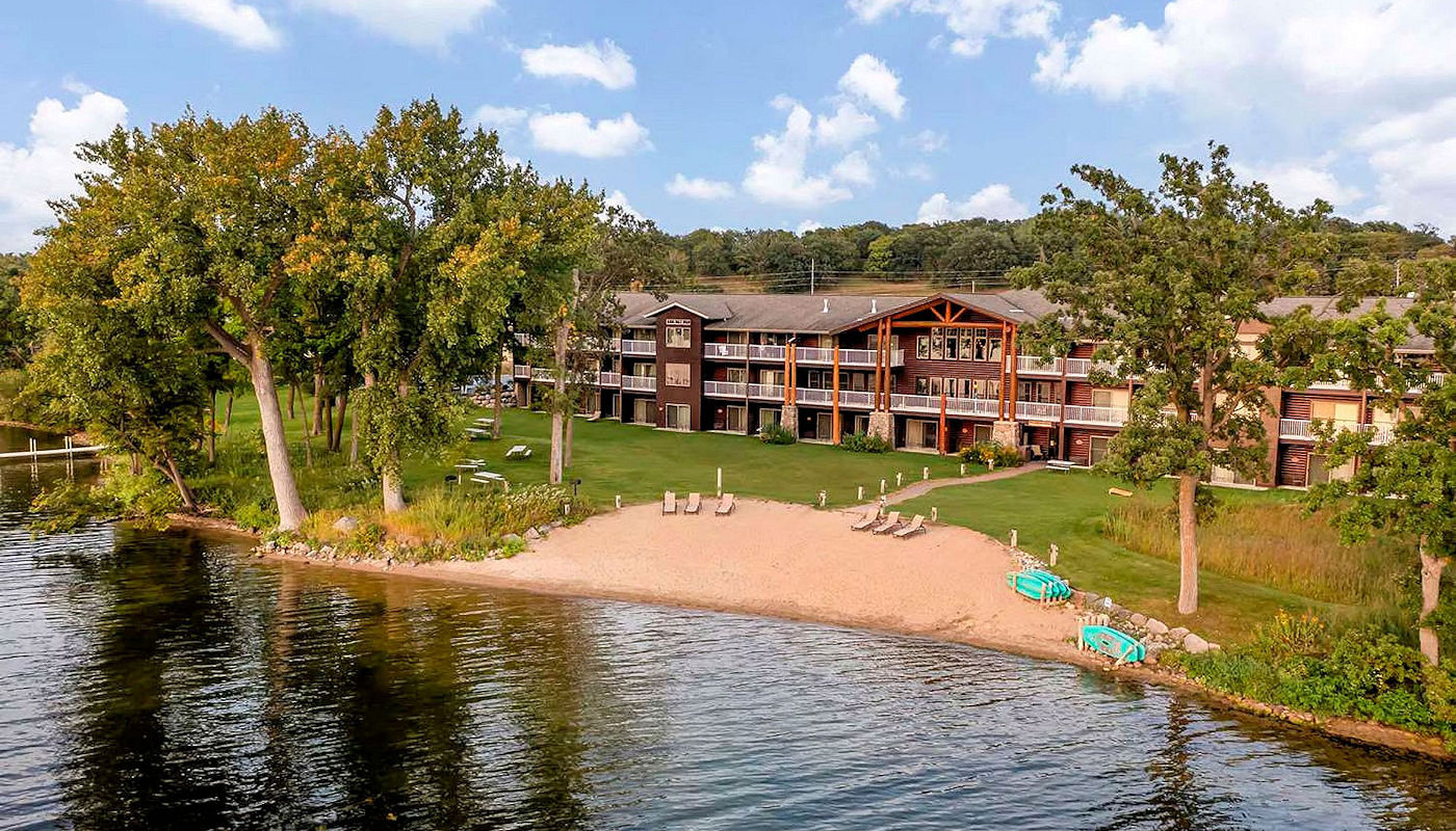 The Lodge on Lake Detroit – Aerial view of beach and resort. The Lodge on Lake Detroit - Aerial view of beach and resort.